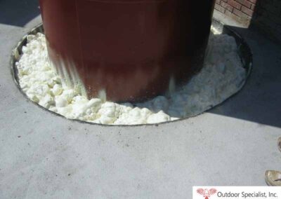 Foam helps absorb movement to prevent building and foundation cracking by 85' sign.
