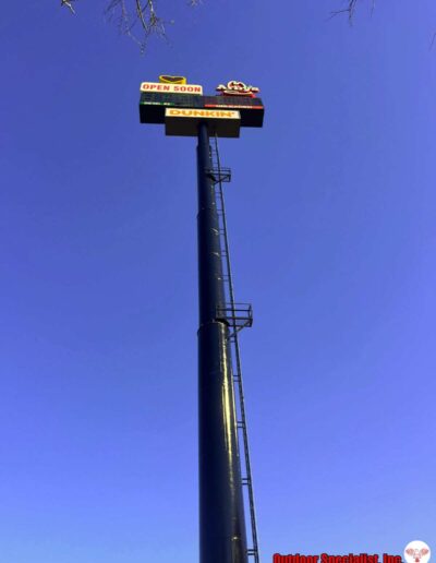 Looking up 200 feet Love's Travel Stop sign by OSI