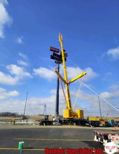 Building a retail sign in pieces using an all-terrain y-guy crane!