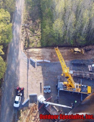 Cranes raising Love's Travel Stop signage by Outdoor Specialist, Inc.